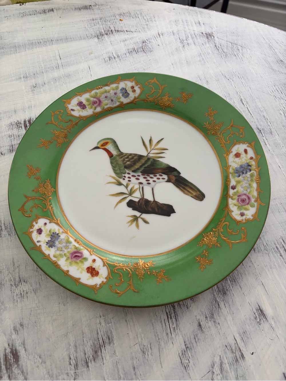 Green Porcelain Decorative Plate with Gold Accents and Bird Motif